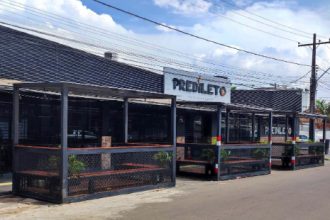 MP exige desobstrução de estacionamento público ocupado sem autorização por restaurante, em Macapá